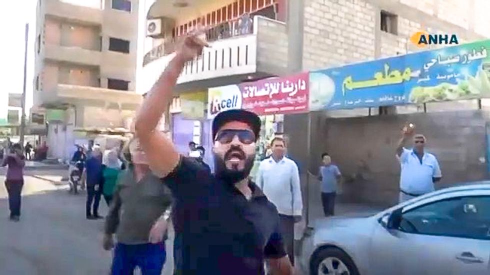 'America is running away like rats': Watch angry Kurds blame US troops for dead babies as they withdraw