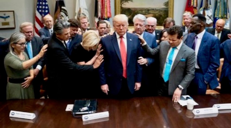 Christian leaders laid hands on and prayed for Donald Trump ahead of impeachment vote