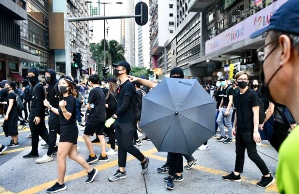 Thousands defy police in latest Hong Kong march