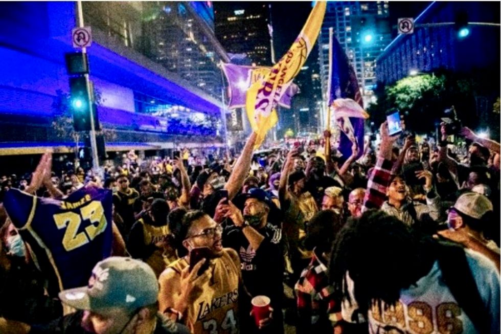 Scores arrested in LA after violence in wake of Lakers' win