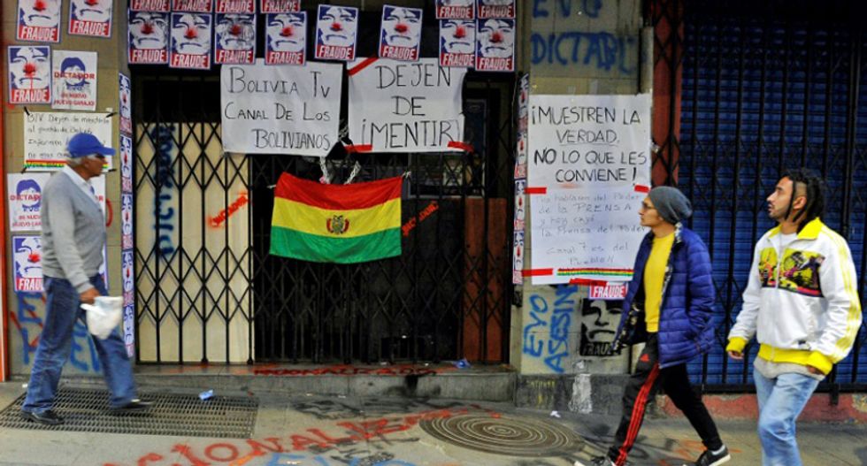 Protesters seize state-run TV in Bolivia as tensions soar