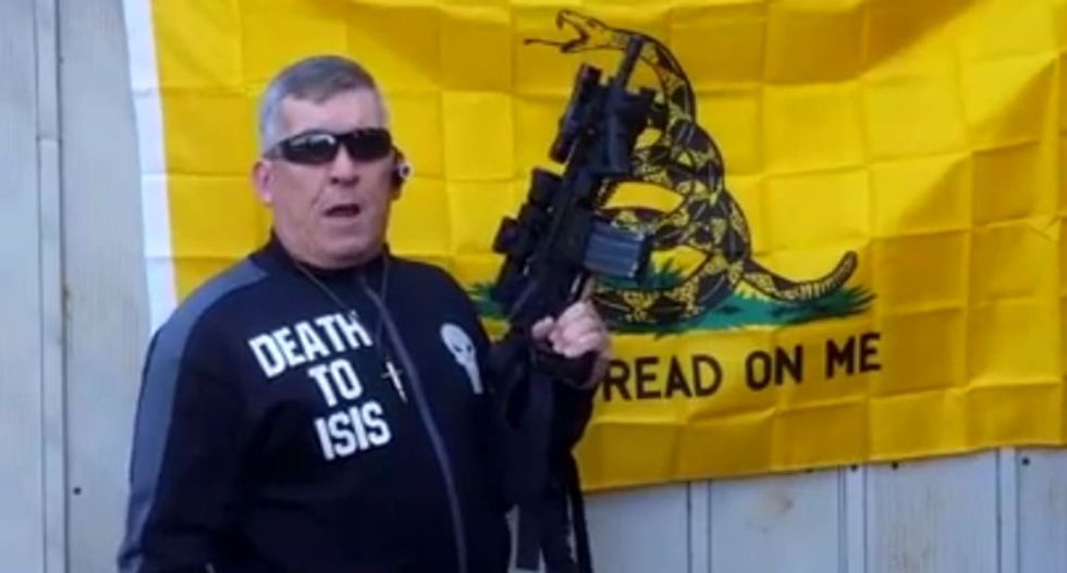 Right-wing militant to shred Quran and pictures of Hillary at rifle-toting Georgia capitol rally