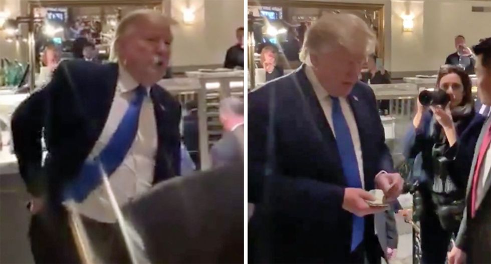 WATCH: The president was spotted at Trump Hotel DC on Saturday night — handing out a wad of cash