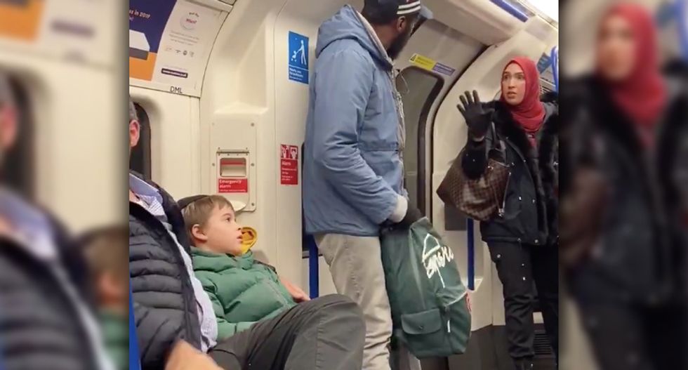 A woman in a hijab comes to the defense of a Jewish family being harassed on a subway