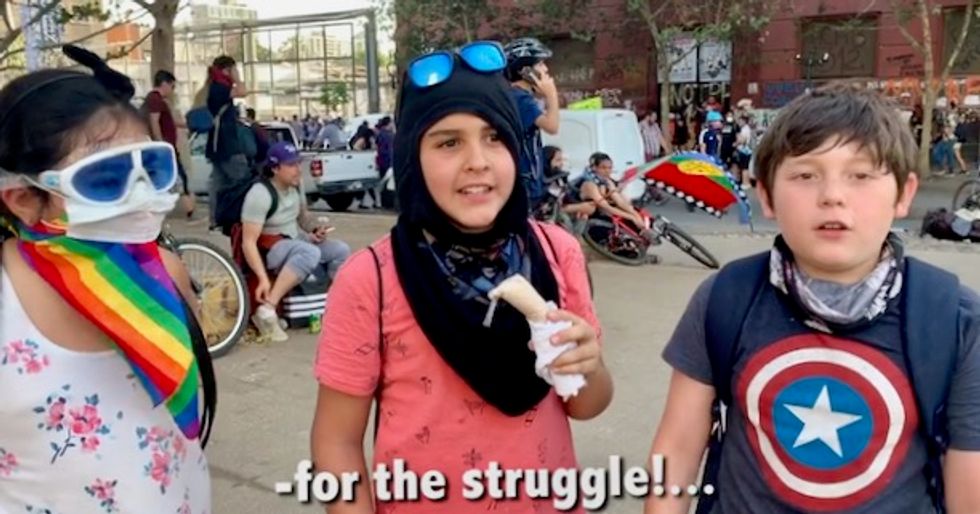 'For the grandparents who need money... for the struggle!': Tear-gassed kids in Chile explain why they protest