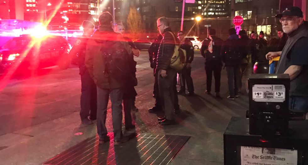 Seattle Times evacuated after bomb threat — journalists worked on the sidewalk to get the newspaper out