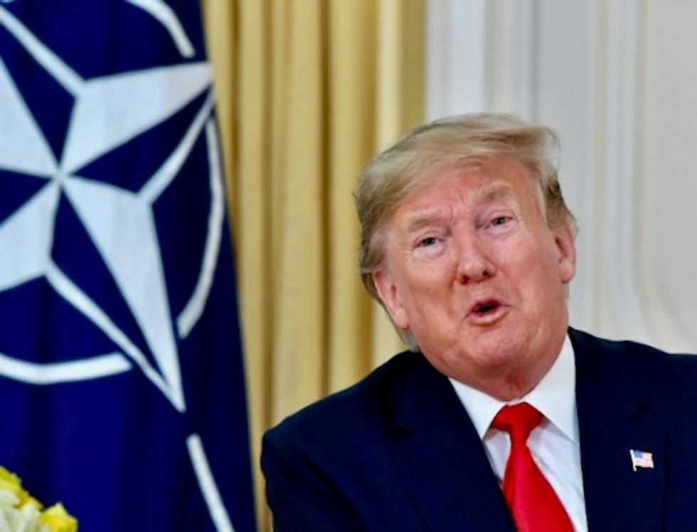 Trump launches NATO meet with attack on 'nasty' France