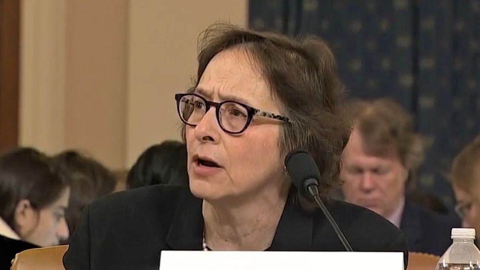 'I'm insulted!' Scholar rains hell on Republican who questioned her integrity at impeachment hearing