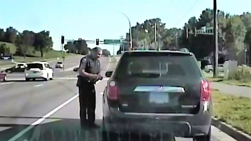 WATCH: Cop busts woman for texting and driving while texting her friend about anti-text-and-driving laws