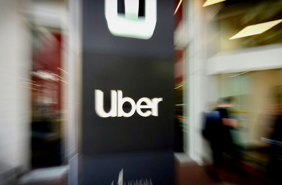 Man behind wheel of self-driving Uber car charged with negligent homicide for running over woman