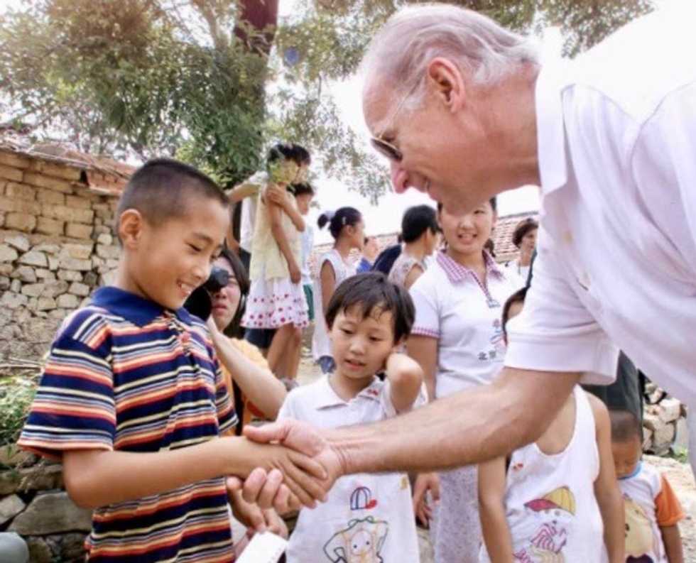 Gifts, popsicles and mass: Chinese villagers recall Biden's 2001 visit