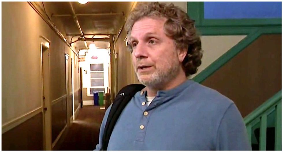 WATCH: Woman finally confronts man who's been spewing racist rants in her hallway for years