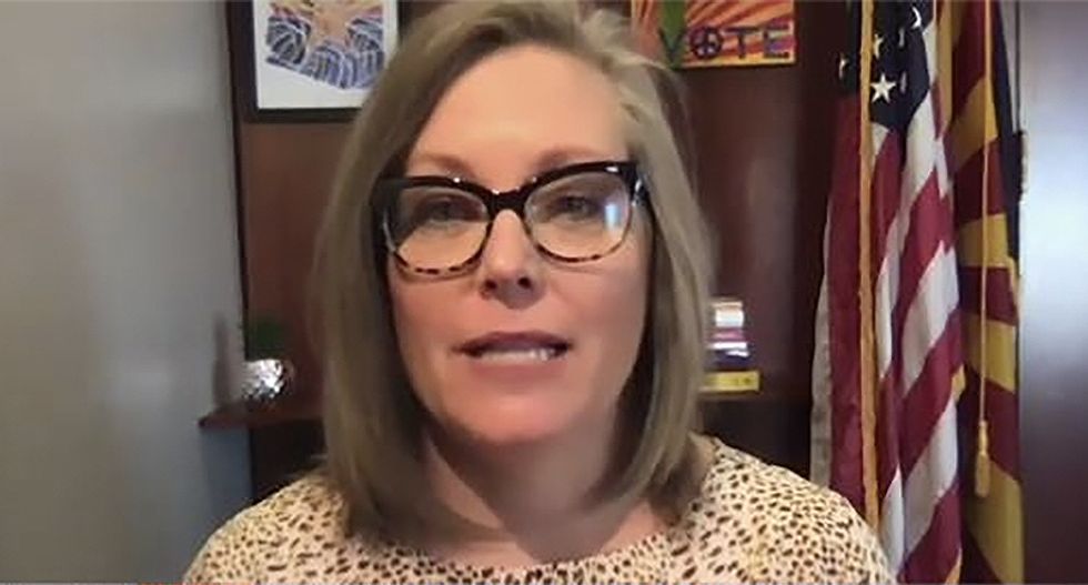 Arizona secretary of state stalked at her home by Trump supporters in 'continued intimidation tactics'