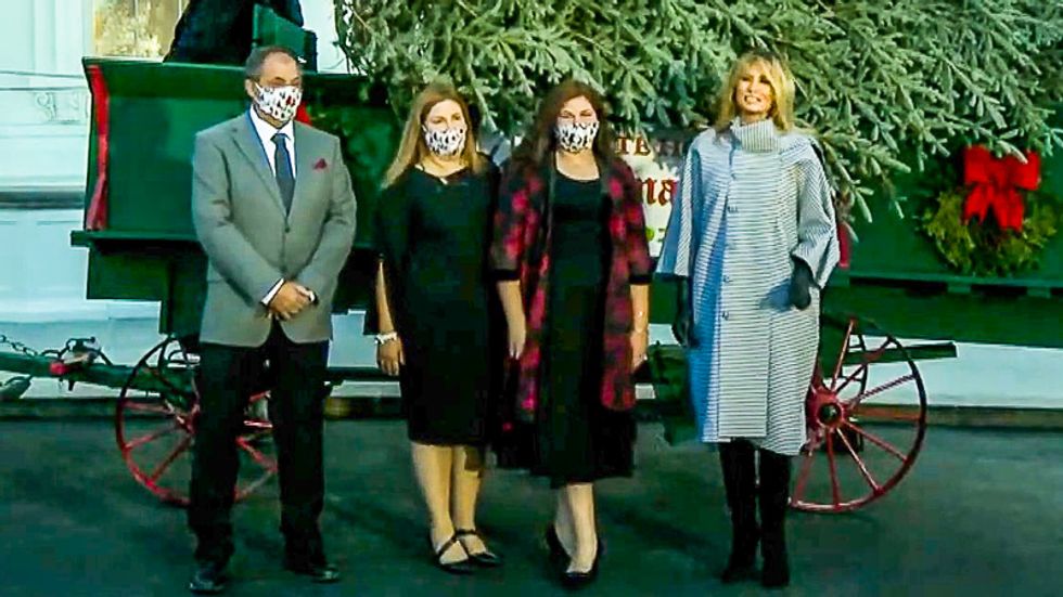 WATCH: Melania Trump goes maskless as she participates in White House Christmas tree delivery