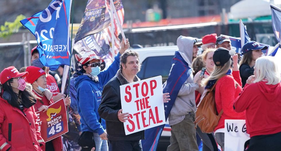Trump-loving protesters who terrorized Michigan secretary of state linked to county GOP group