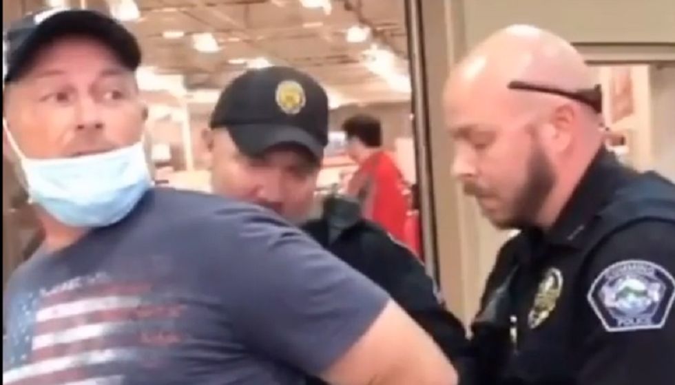 WATCH: Trump-loving father-son duo throw tantrum over masks -- and whine as cops escort them from store