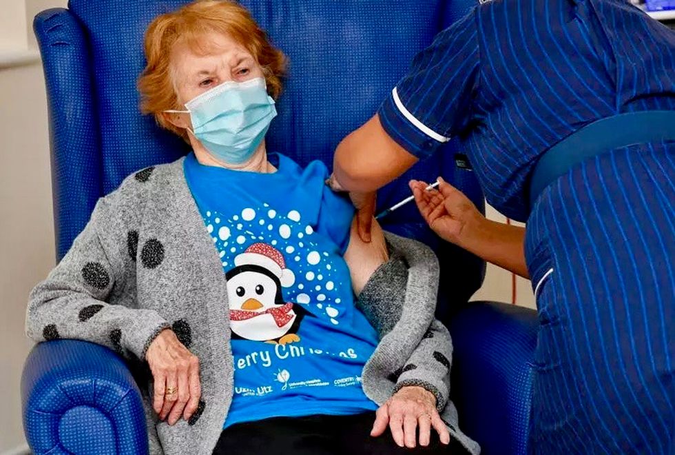 Britain starts virus vaccinations as California locks down