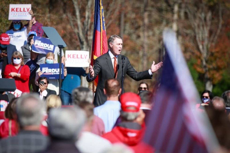 Trump's runoff rally forces question: How much will he help Loeffler and Perdue?