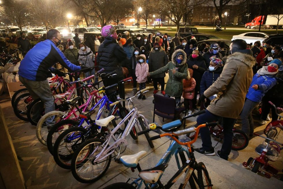In some neighborhoods, Santa is a volunteer kids see every day