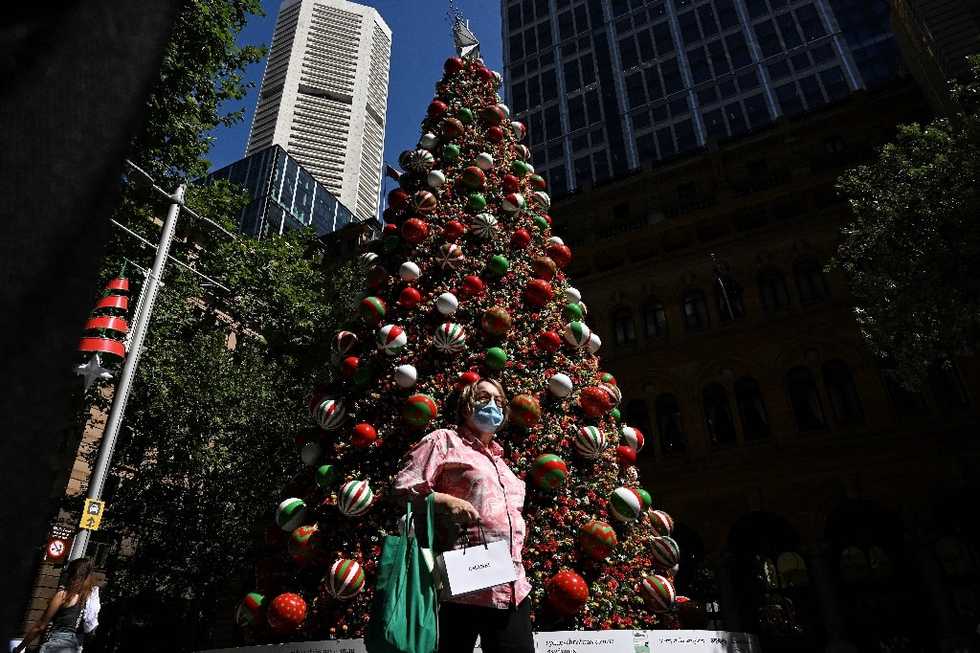 Virus dampens holidays worldwide as vaccinations gather speed