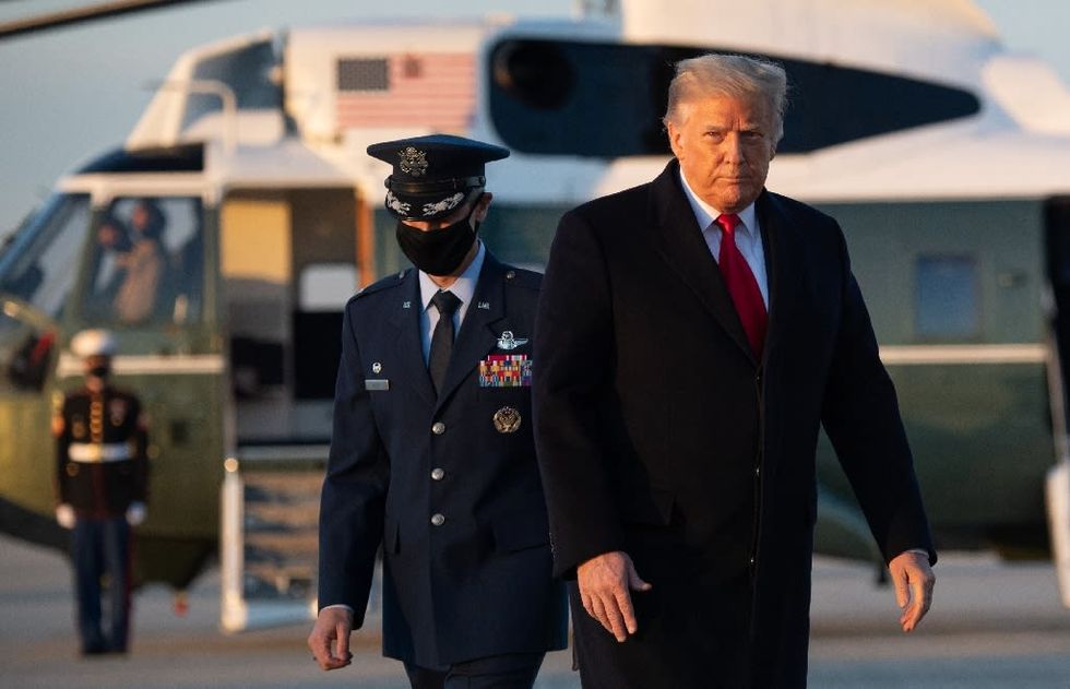 With pardons, Trump seeks to erase stain of Russia probe