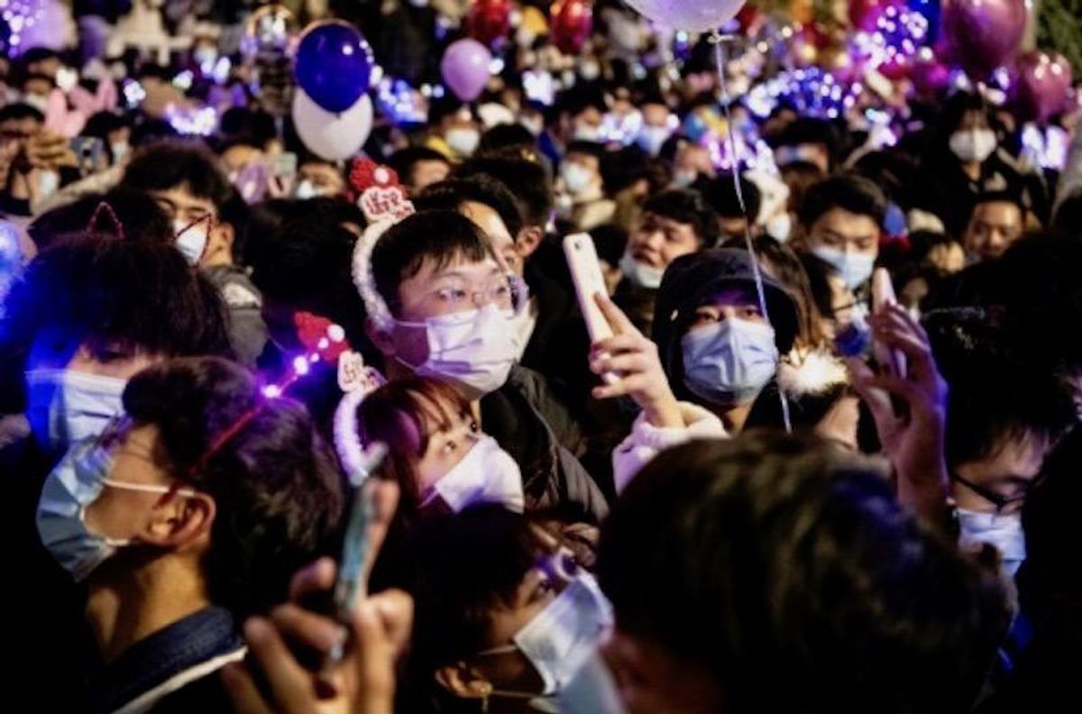 Crowds throng Wuhan, where pandemic began, to celebrate New Year