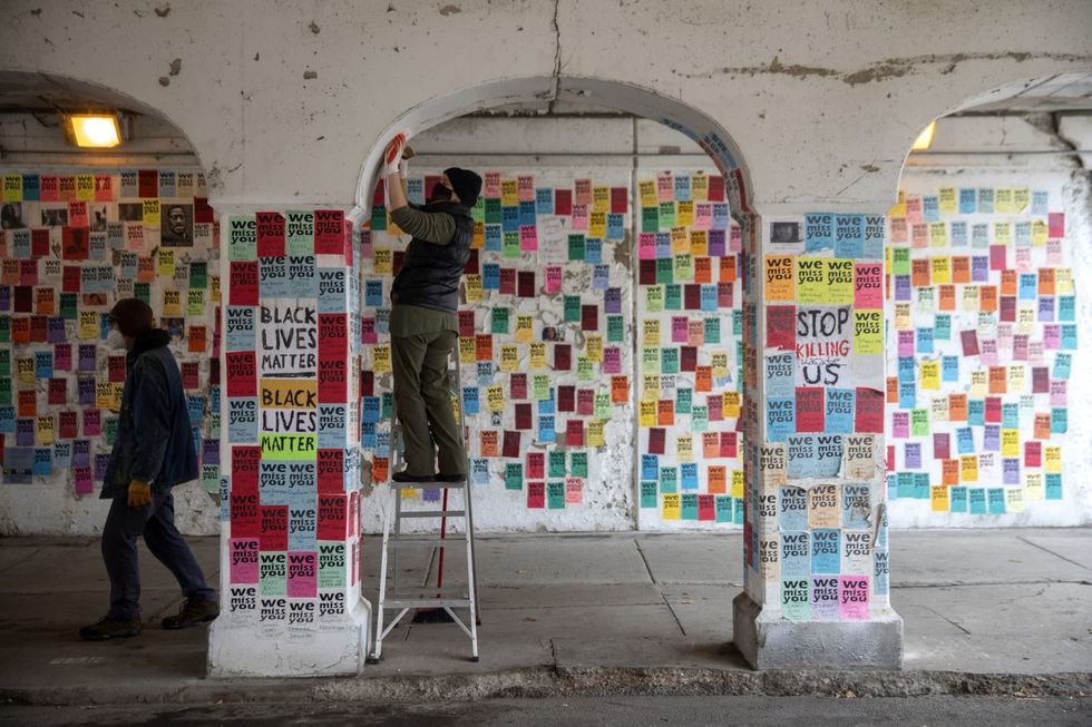 Volunteers create Black Lives Matter memorial in Chicago with the names of people killed by police