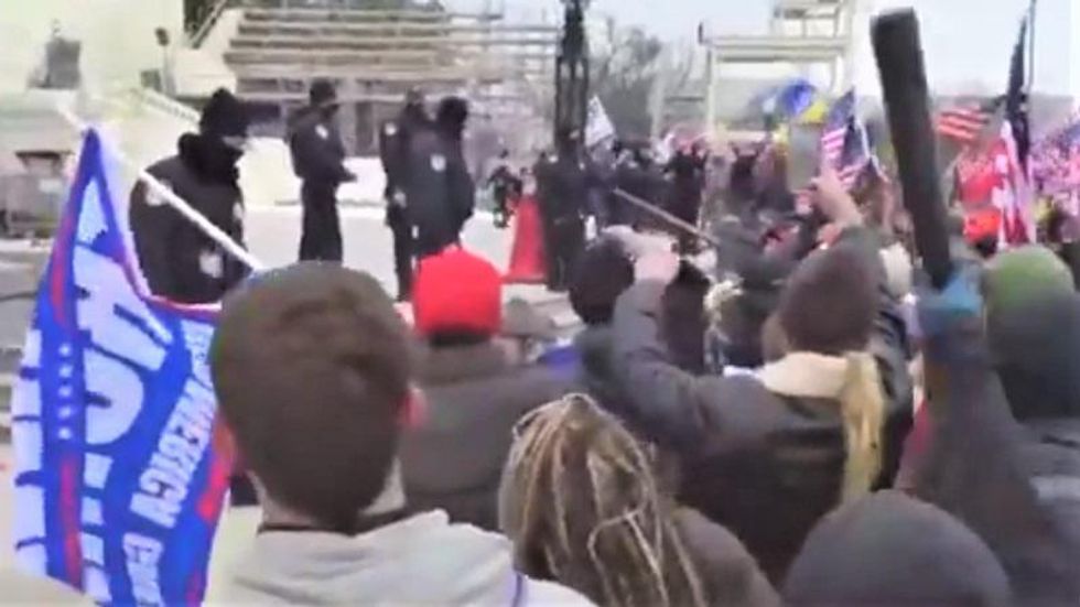 Violence erupts in DC as Trump supporters attempt to storm the Capitol building