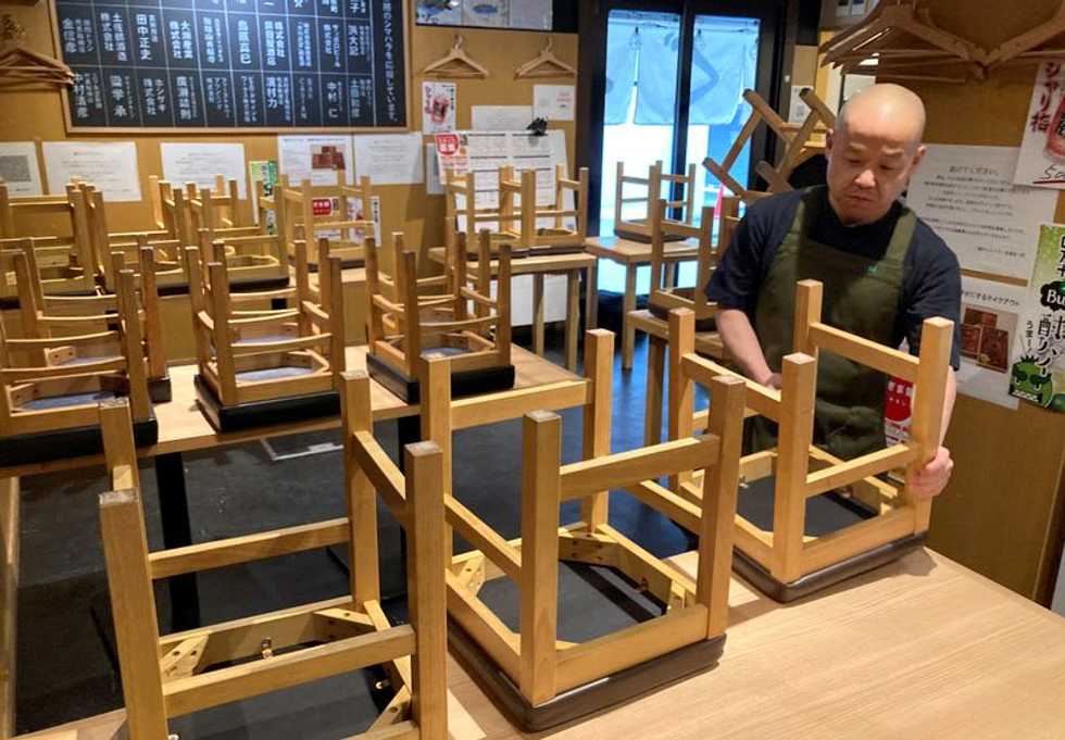 Japan's COVID crisis reawakens deflation fears as cash hoarding returns