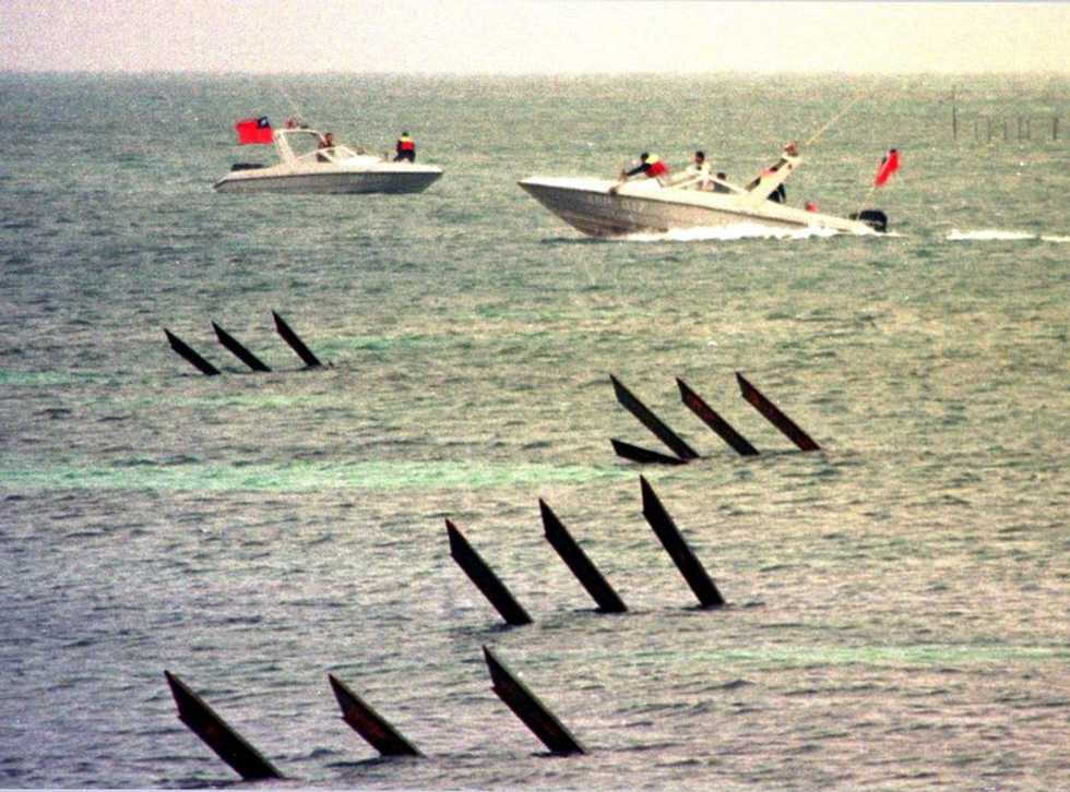 Taiwan says Chinese fighters and US aircraft both entered defense zone