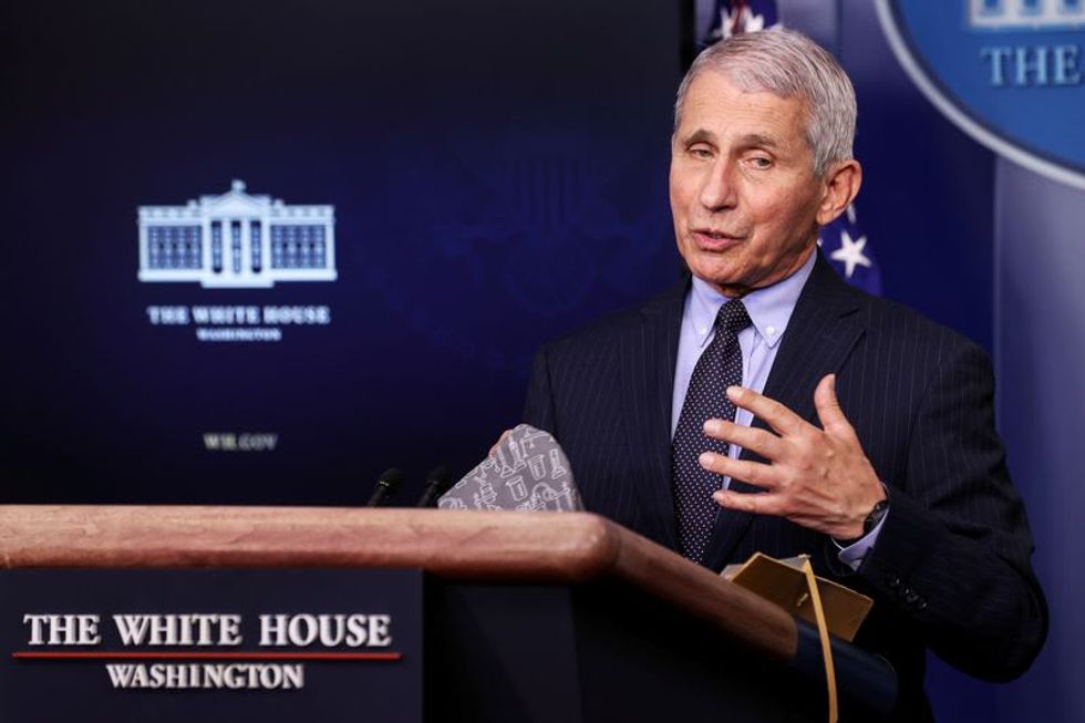 Fauci says it is possible Americans will still be wearing masks in 2022