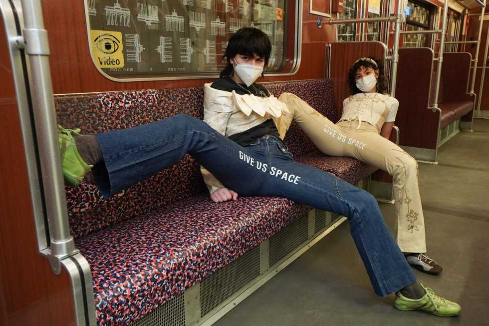Berlin artists spread message against men taking up too much space
