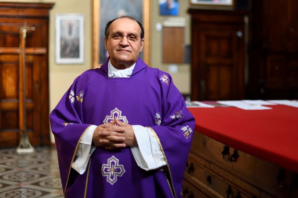 Italian priest recalls COVID-19 'nightmare' of coffin-filled church