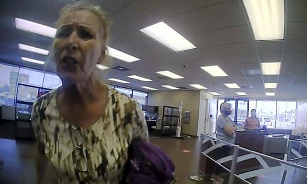 Cops arrest indignant anti-masker -- after she rants 'What are you going to do, arrest me?'