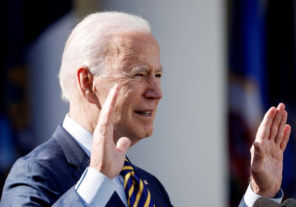 Biden vows Russia's Putin will 'pay a price' for meddling in the 2020 election on behalf of Trump
