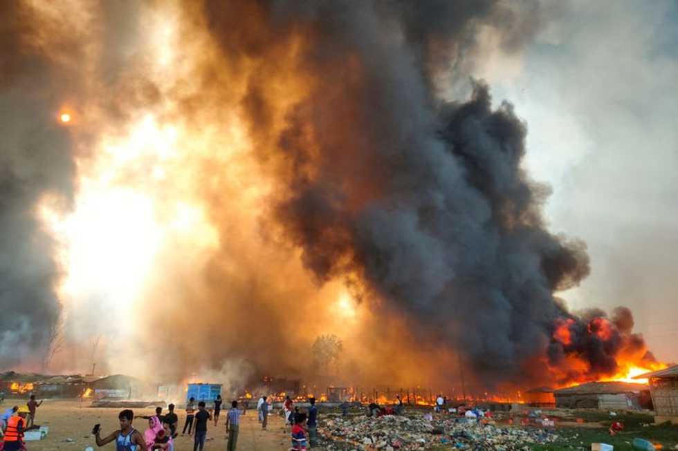 Several dead, thousands of homes burn as fire sweeps Rohingya camp: witnesses