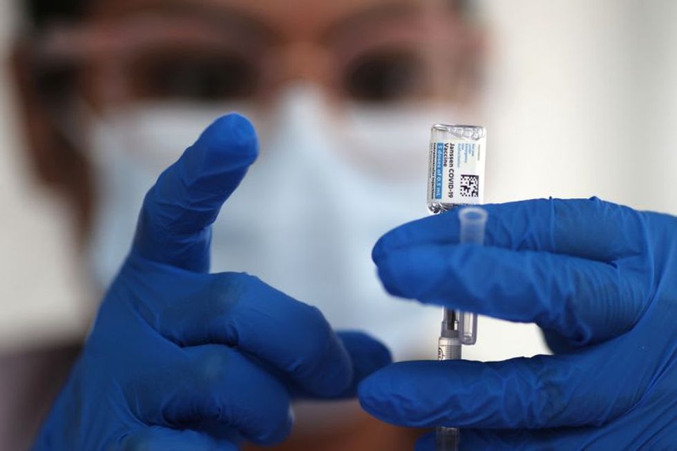 U.S. vaccination campaign gains steam as White House speeds shipments