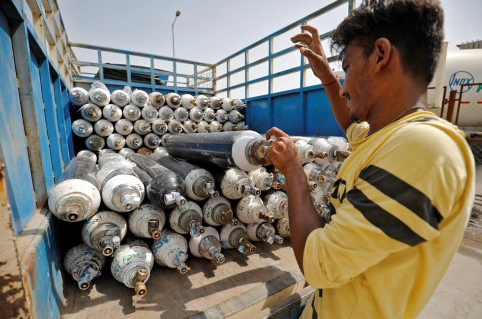 Oxygen gets armed escort in India as supplies run low in COVID crisis