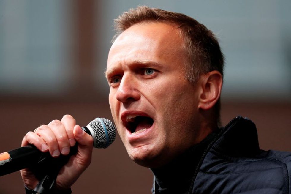 Allies of Russia's Navalny defiant in face of possible extremism charges