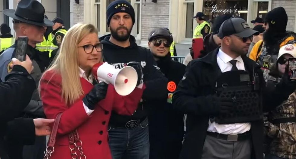 'Lock and load': The top Virginia gubernatorial candidate has aligned herself with Proud Boys, Oath Keepers and other extremists