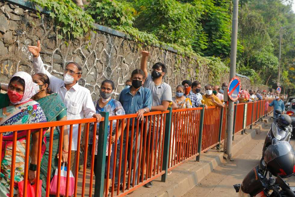 India's vaccine drive crumbles as daily virus cases near 400,000