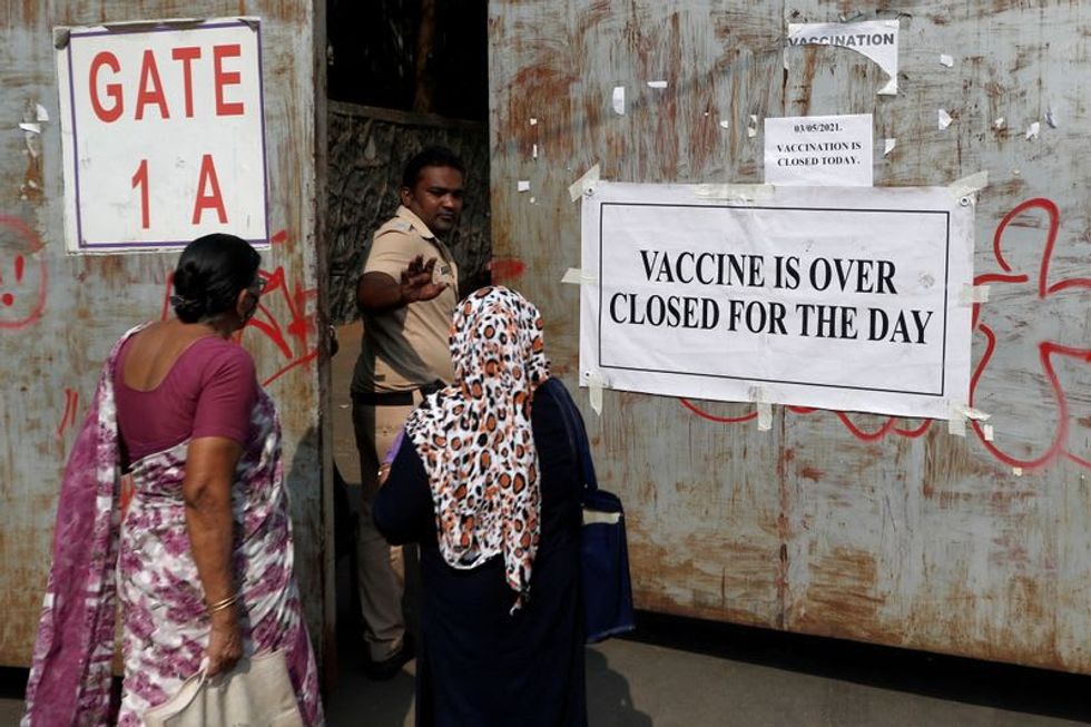 High-tech hunt for scarce COVID-19 vaccines in India raises fear for fairness