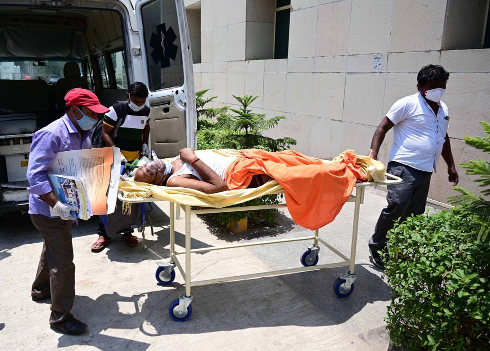 India sees 403,000 new virus cases, 4,092 deaths in 24 hours