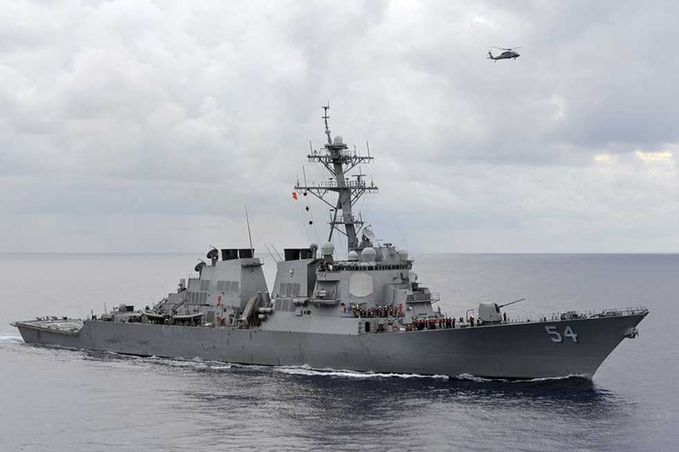China says US threatening peace as Navy warship transits Taiwan Strait
