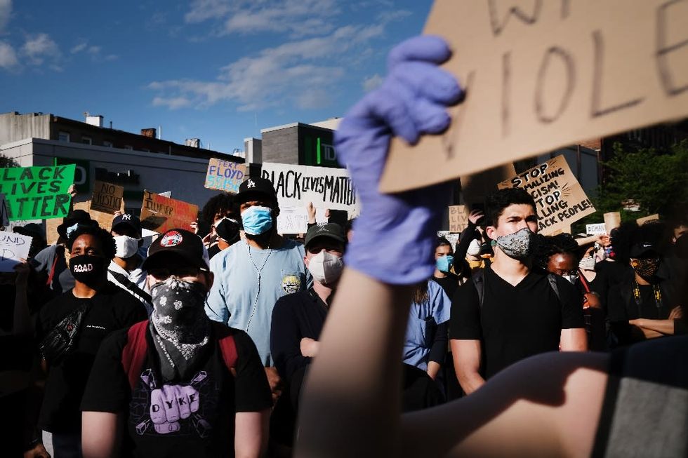 Big US companies pushed to tally progress on racial justice