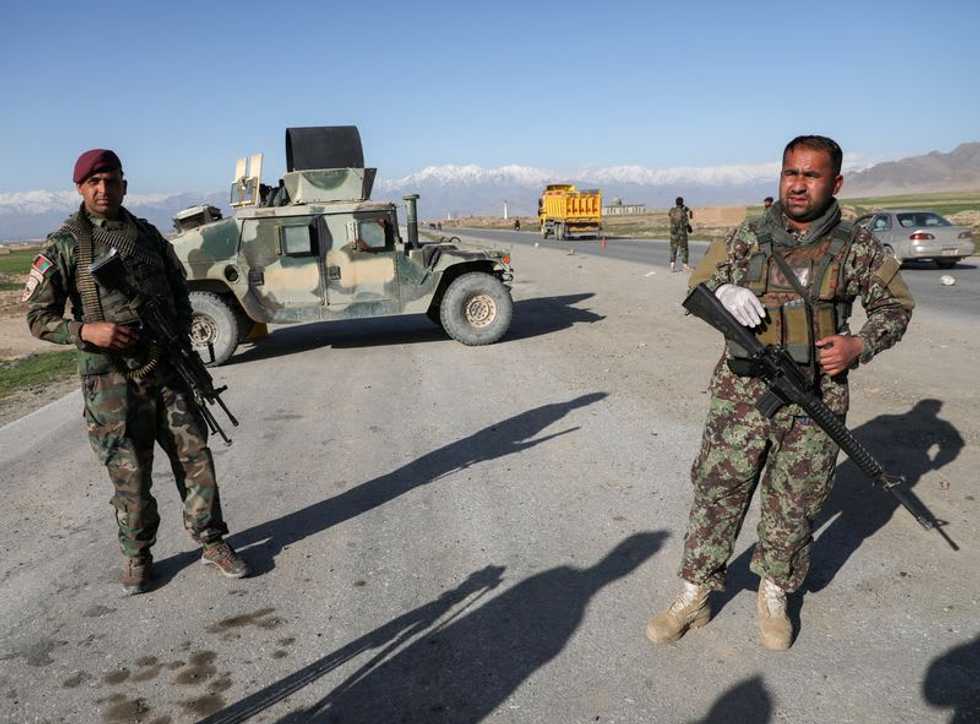 Western forces pack up to end their war, Afghans "manage the consequences"