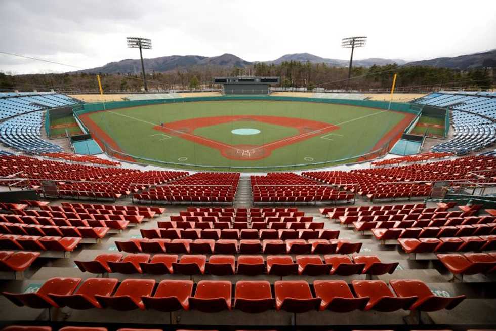 Japan's Fukushima, in reversal, bars spectators from Olympic events