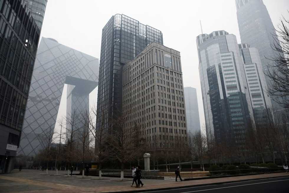 China's economic growth more than halves in second quarter