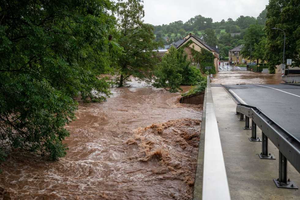 Thirty people missing as deadly floods hit Germany, collapsing houses