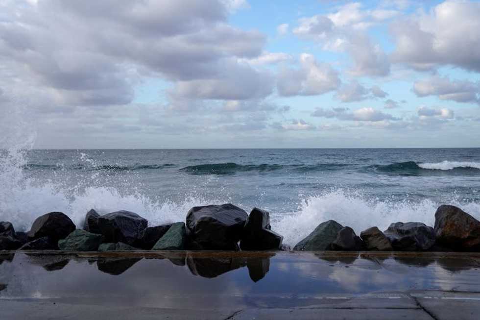 Moon 'wobble,' climate change seen as driving coastal flooding in 2030s